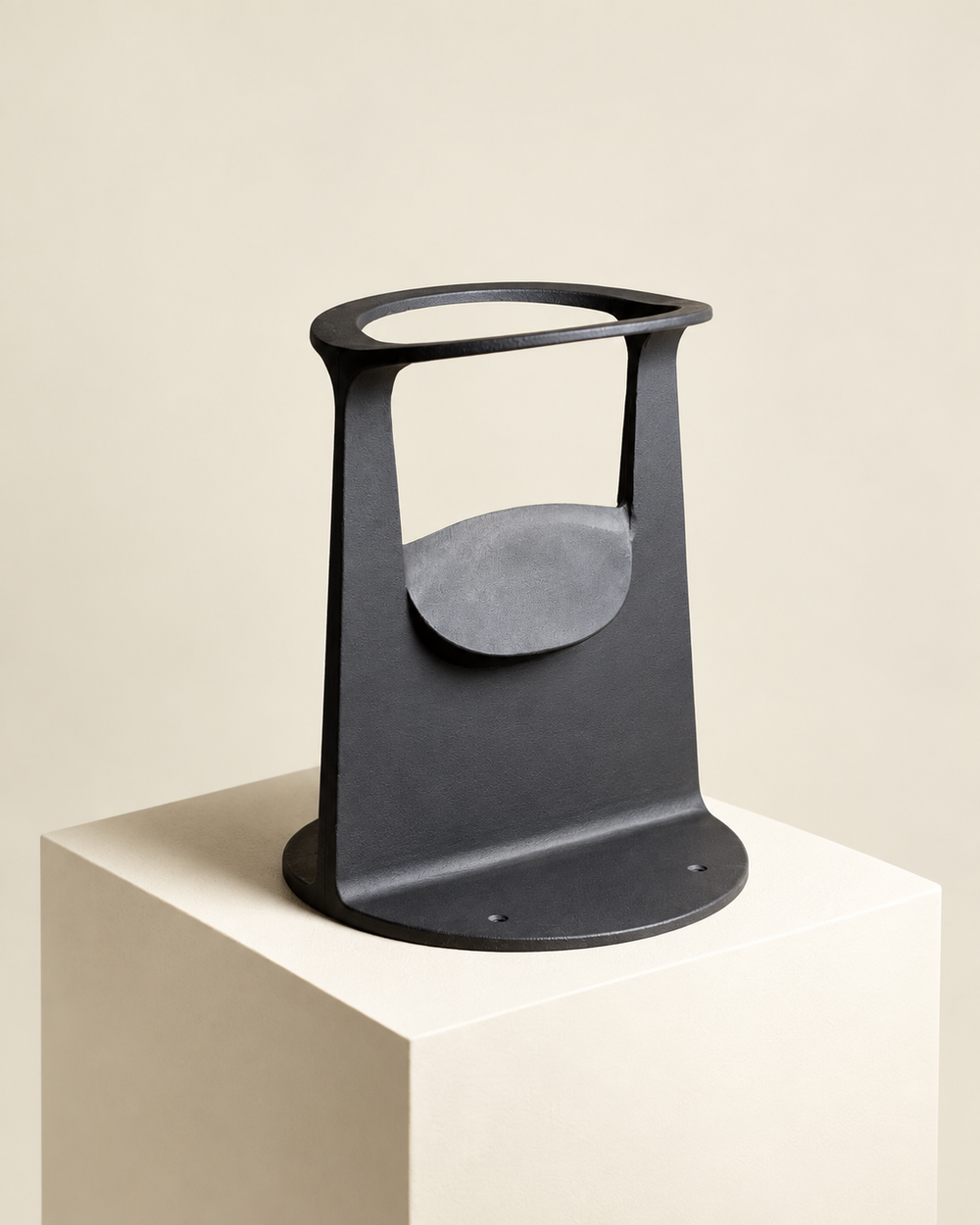 Right three-quarter view of a black cast iron kindling splitter