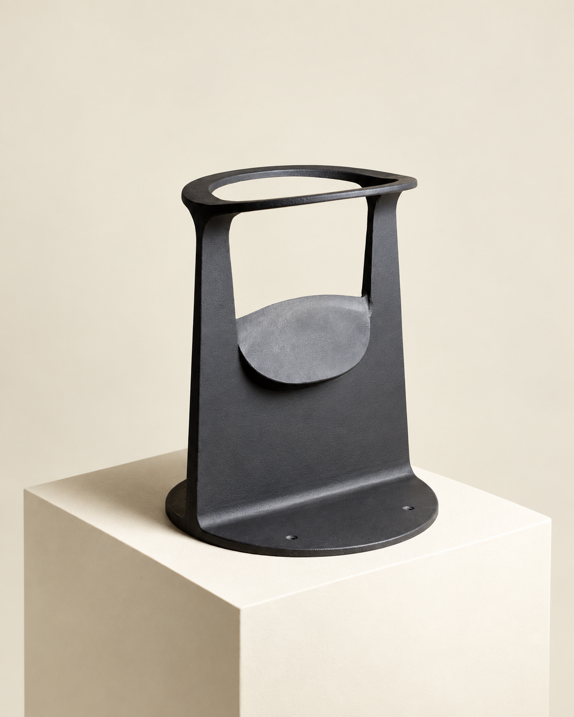 Right three-quarter view of a black cast iron kindling splitter