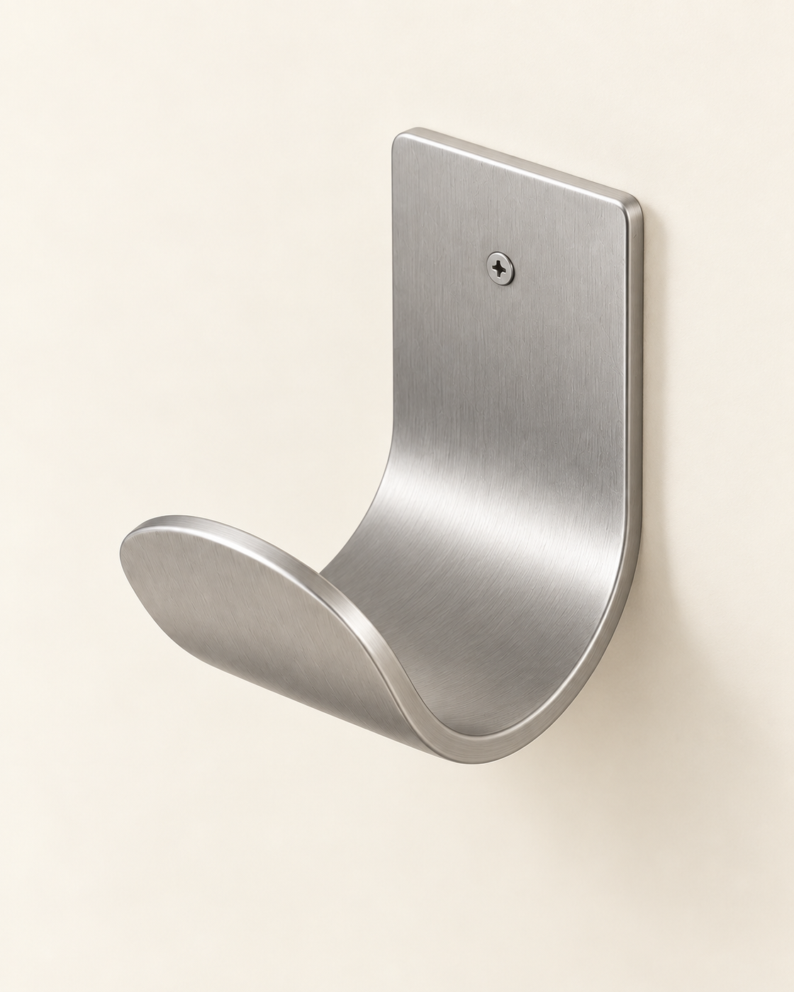 Minimalist stainless steel garden hose hanger viewed from above